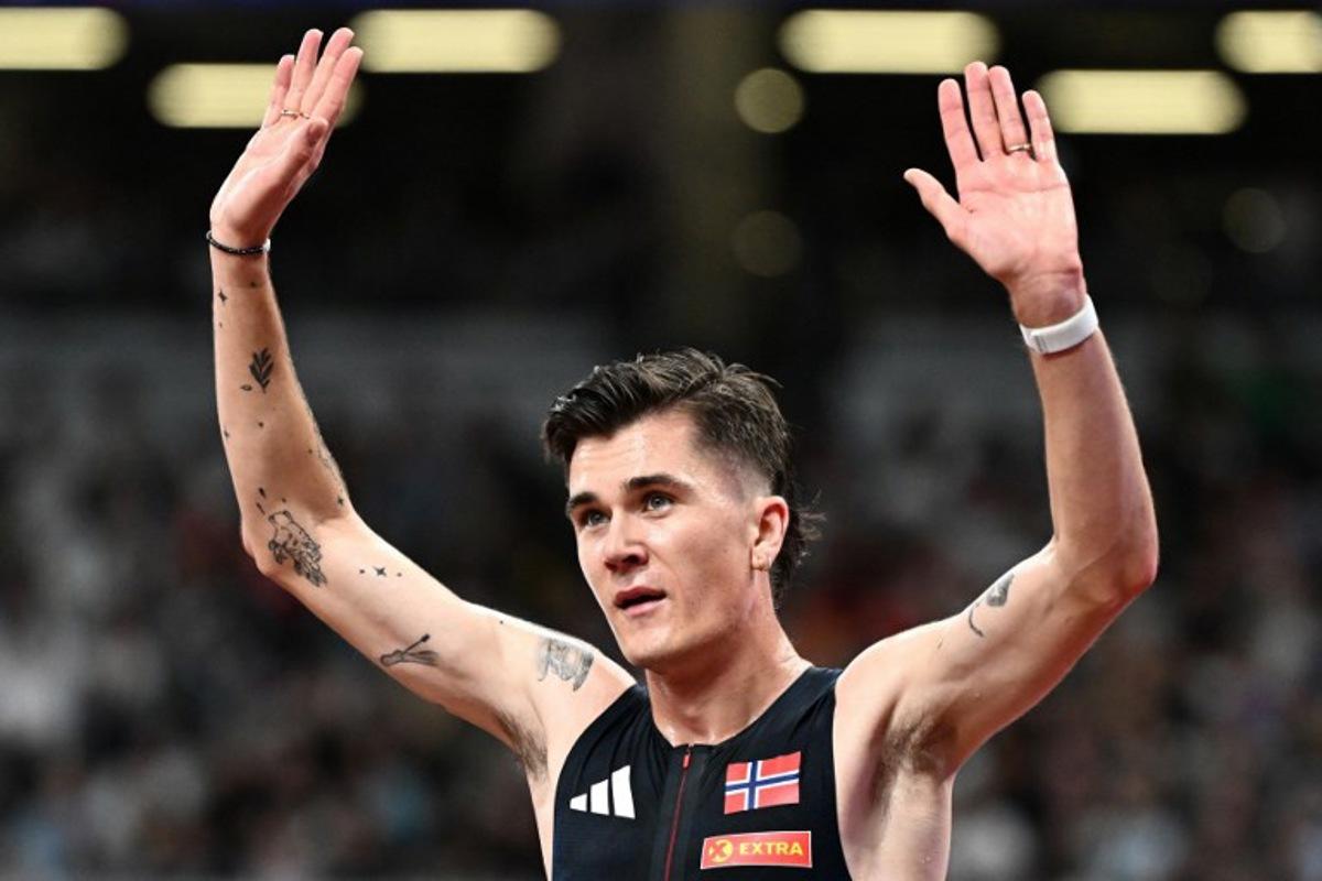 Norway's Jakob Ingebrigtsen reacts after competing in the men's 5000m heats during the World Athletics Championships in Tokyo on September 19, 2025.  Jewel SAMAD / AFP