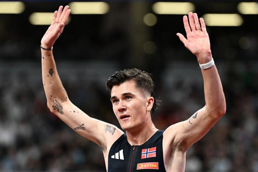 Norway's Jakob Ingebrigtsen reacts after competing in the men's 5000m heats during the World Athletics Championships in Tokyo on September 19, 2025.  Jewel SAMAD / AFP
