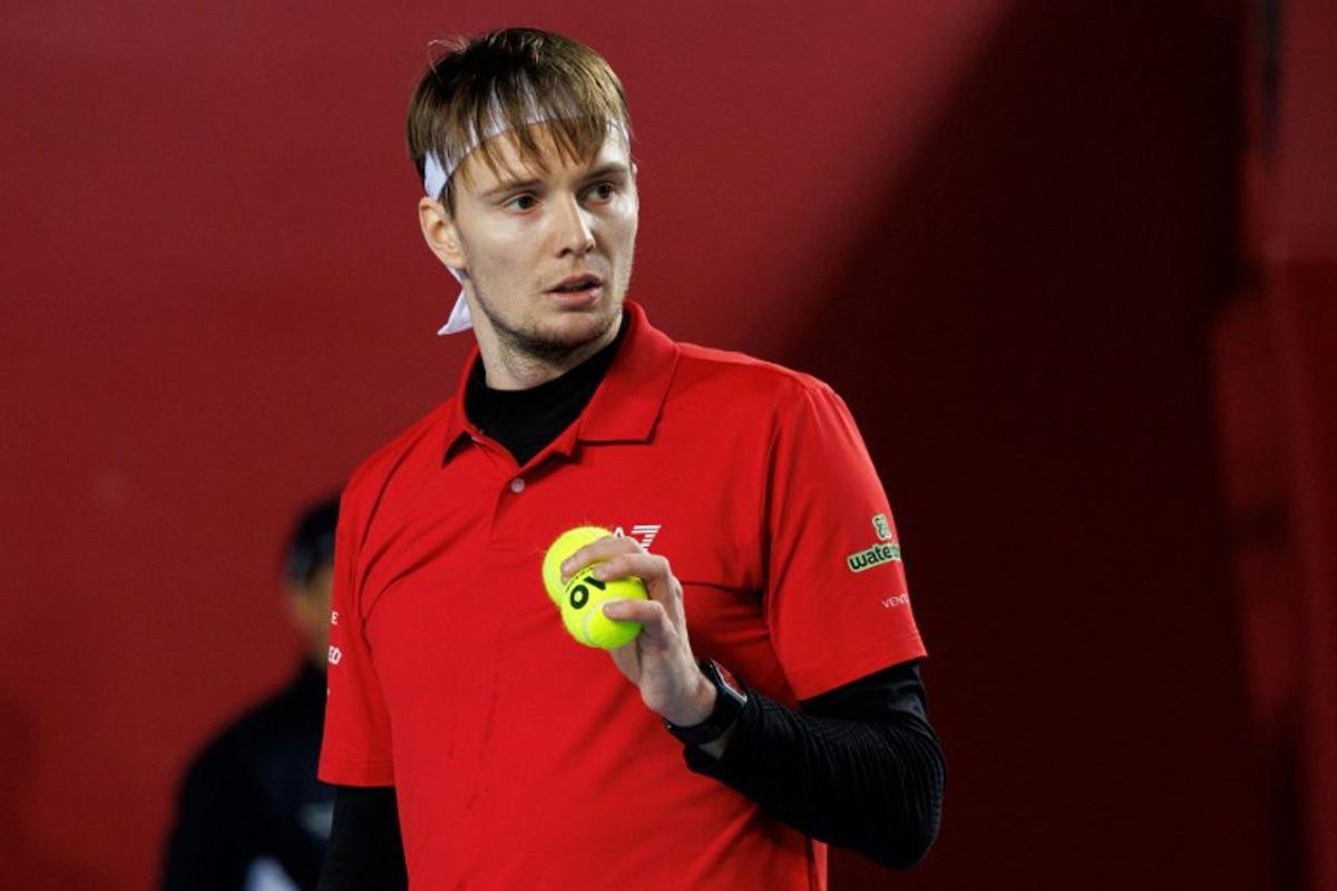 Kazakhstan's Alexander Bublik prepares to serve against China's Shang Juncheng during their men's singles quarter-final match at Hong Kong Tennis Open in Hong Kong on January 9, 2026.  May JAMES / AFP