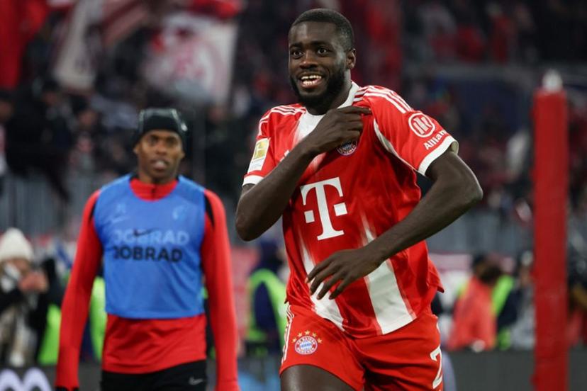 Bayern Munich's French defender #02 Dayot Upamecano celebrates scoring his team's third goal during the German first division Bundesliga football match between FC Bayern Munich and SC Freiburg in Munich, southern Germany on November 22, 2025.  Karl-Josef HILDENBRAND / AFP