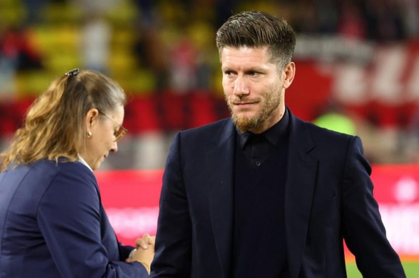(FILES) Monaco's Belgian head coach Sebastien Pocognoli looks on before the French L1 football match between AS Monaco and RC Lens at the Stade Louis II in the Principality of Monaco on November 8, 2025.  Clement MAHOUDEAU / AFP