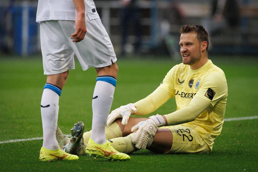 Club's goalkeeper Simon Mignolet lies injured on the ground during a soccer match between KAA Gent and Club Brugge, Sunday 20 April 2025 in Gent, on day 4 (out of 10) of the Champions' Play-offs of the 2024-2025 'Jupiler Pro League' first division of the Belgian championship. BELGA PHOTO KURT DESPLENTER