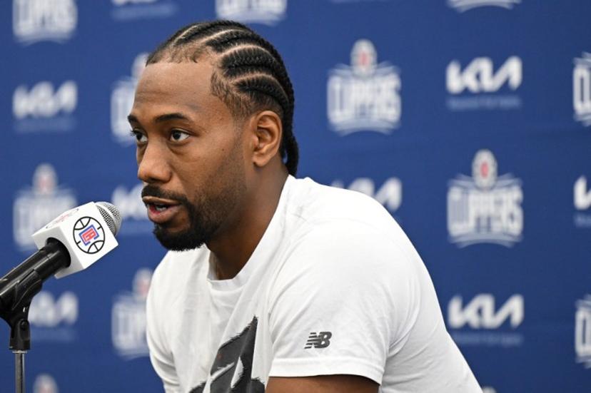 Los Angeles Clippers Kawhi Leonard speaks to members of the press during the Los Angeles Clippers media day at the Honey Training Center in Playa Vista, California, on September 26, 2022.  Patrick T. FALLON / AFP