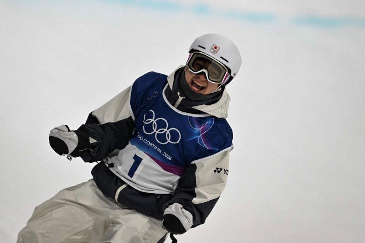Japan's Yuto Totsuka reacts after competing in the snowboard men's halfpipe final run 2 during the Milano Cortina 2026 Winter Olympic Games at Livigno Snow Park, in Livigno (Valtellina), on February 13, 2026.  Jeff PACHOUD / AFP
