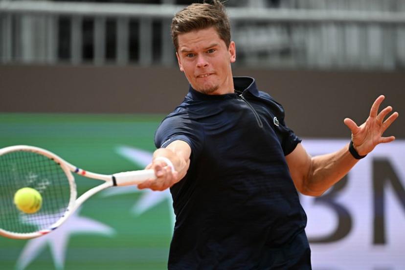 Belgium's Alexander Blockx returns the ball to Italy's Federico Cina during the ATP Rome Open tennis tournament at Foro Italico in Rome on May 7, 2026.   Tiziana FABI / AFP