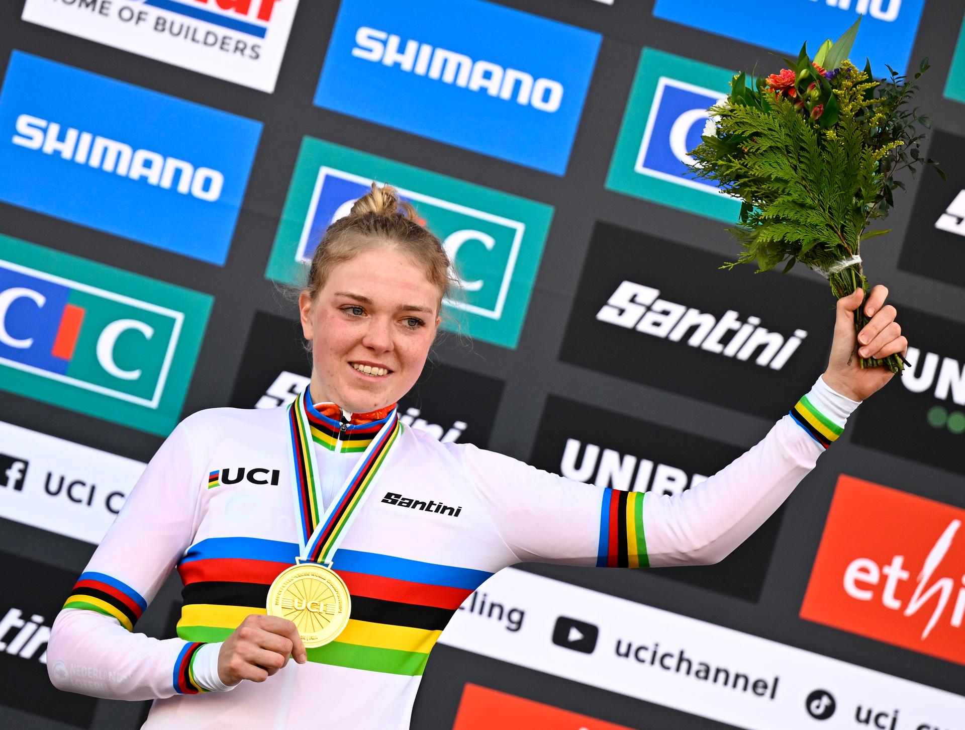 Dutch Fem Van Empel celebrates on the podium after winning the women elite race, at the UCI Cyclocross World Championships, in Lievin, France, Saturday 01 February 2025. The world championships are taking place from 31 January until 02 February. BELGA PHOTO JASPER JACOBS