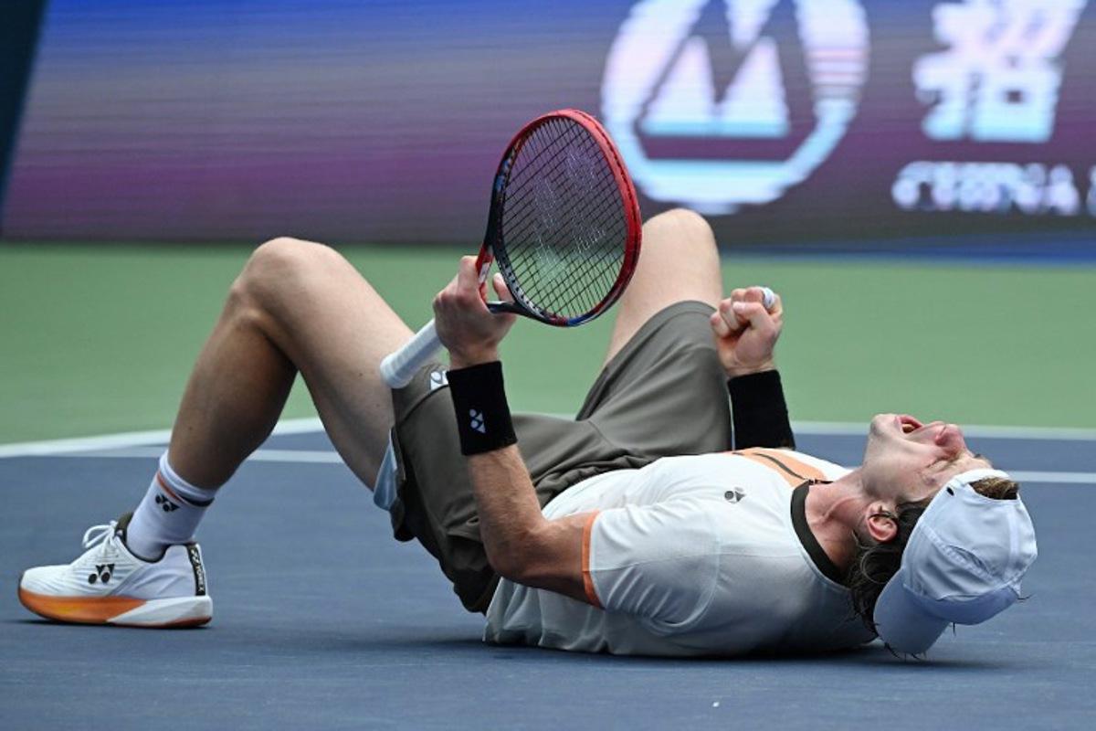Belgium's Zizou Bergs celebrates after winning against Canada's Gabriel Diallo in their men's singles match at the Shanghai Masters tennis tournament in Shanghai on October 7, 2025.  JADE GAO / AFP