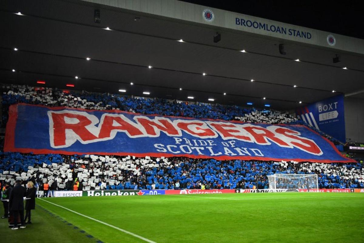Rangers fans display a large banner in the crowd ahead of the UEFA Europa League group C football match between Rangers and Aris Limassol at the Ibrox Stadium in Glasgow on November 30, 2023.  ANDY BUCHANAN / AFP