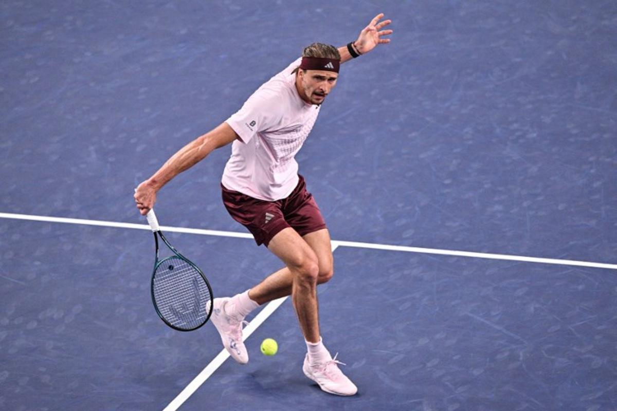 Germany's Alexander Zverev hits a return to Australia's Alex de Minaur during their men's singles quarter-final match at the Shanghai Masters tennis tournament in Shanghai on October 15, 2026.  Hector RETAMAL / AFP