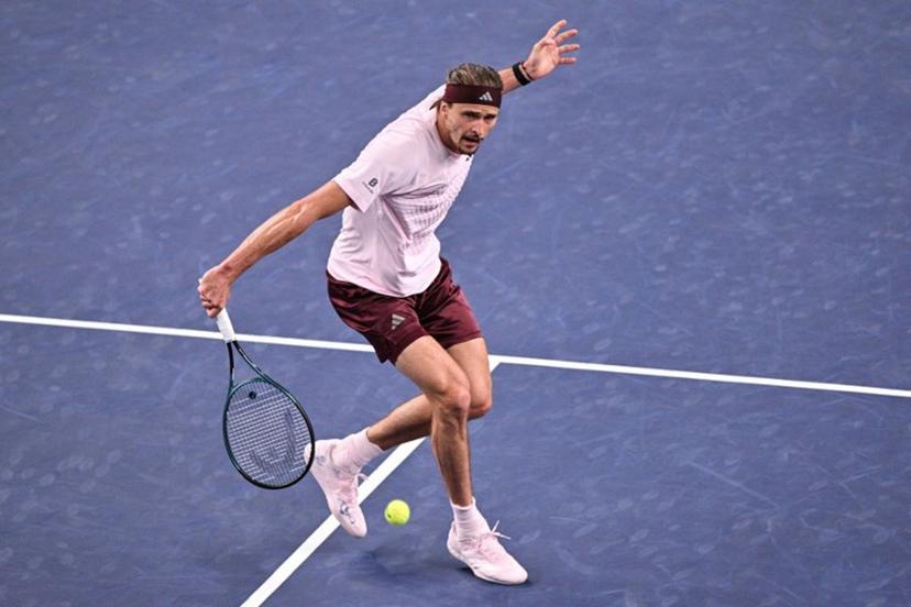Germany's Alexander Zverev hits a return to Australia's Alex de Minaur during their men's singles quarter-final match at the Shanghai Masters tennis tournament in Shanghai on October 15, 2026.  Hector RETAMAL / AFP