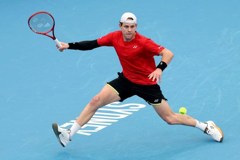 Belgium's Zizou Bergs hits a return to China's Zhang Zhizhen during their men's singles match at the United Cup tennis tournament on Ken Rosewall Arena in Sydney on January 3, 2026.  DAVID GRAY / AFP