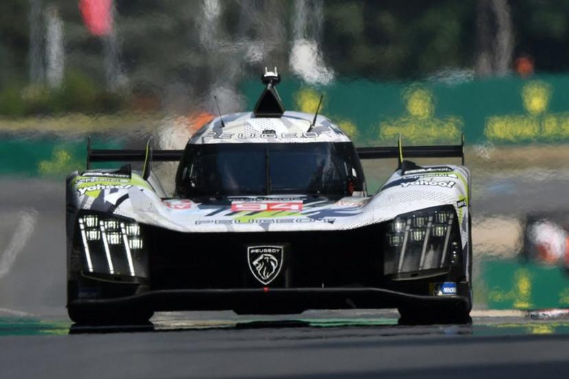 Peugeot Totalenergies Belgian driver #94 Stoffel Vandoorne steers his hypercar during the third free practice for the 2025 Le Mans 24 hour endurance race at the Le Mans circuit, in northwestern France, on June 12, 2025.  Jean-Francois MONIER / AFP
