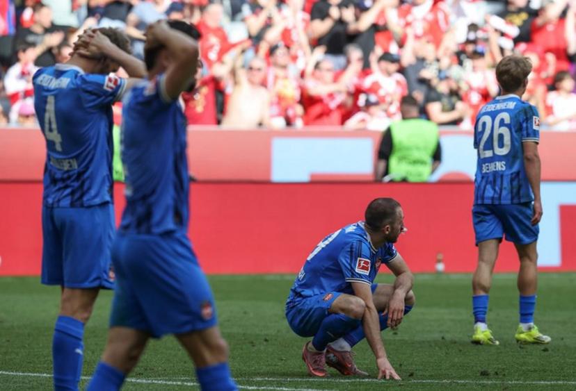 Heidenheim's German defender #19 Jonas Foehrenbach reacts after the German first division Bundesliga football match between FC Bayern Munich and Heidenheim in Munich on May 2, 2026.  Alexandra BEIER / AFP