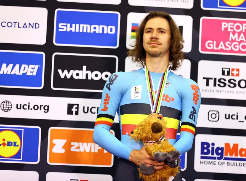 Belgian Niels Verschaeren celebrates on the podium after winning the bronze medal at the Men C5 1km Time Trial race at the UCI World Championships Cycling, in Glasgow, Scotland, Saturday 05 August 2023. UCI organizes the worlds with all cycling disciplines, road cycling, indoor cycling, mountain bike, BMX racing, road paracycling and indoor paracycling, in Glasgow from 05 to 13 August. BELGA PHOTO DAVID PINTENS