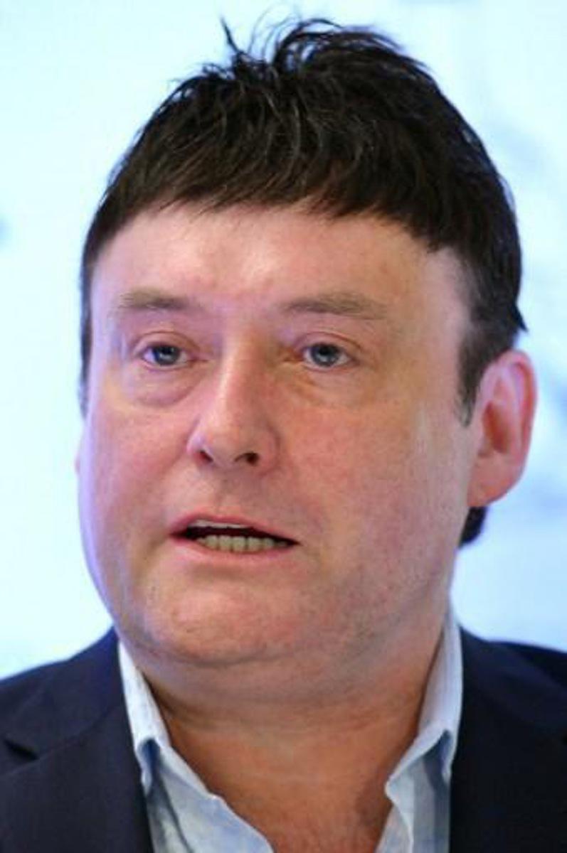 British snooker player Jimmy White addresses a press conference in London, on February 26, 2013. AFP PHOTO / BEN STANSALL