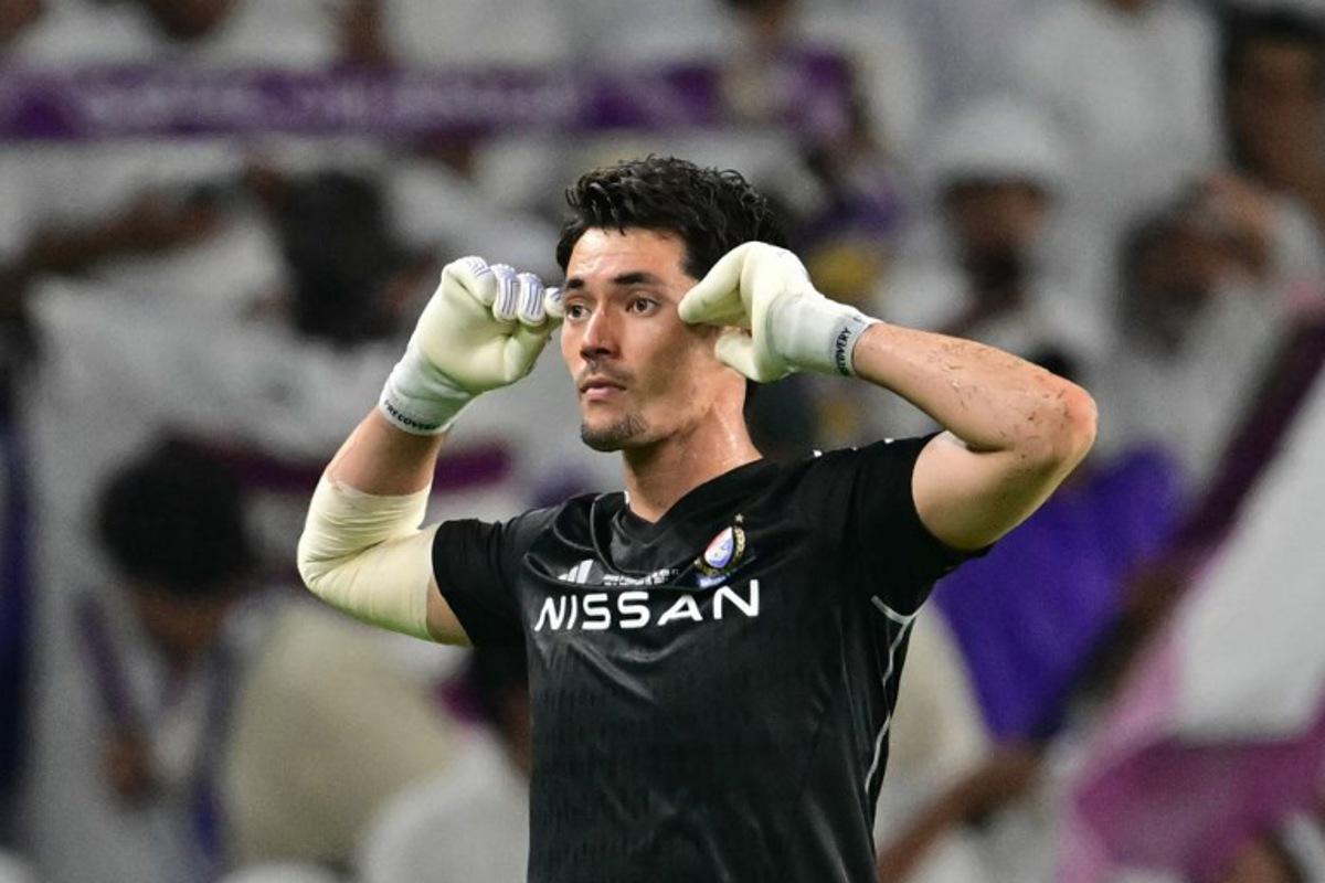 Yokohama's Japanese goalkeeper #42 William Popp leaves the pitch after receiving a red card during the second leg of the AFC Champions League Final between UAE's Al Ain and Japan's Yokohama F. Marinos at the Hazza Bin Zayed Stadium in Al-Ain on May 25, 2024.  Giuseppe CACACE / AFP