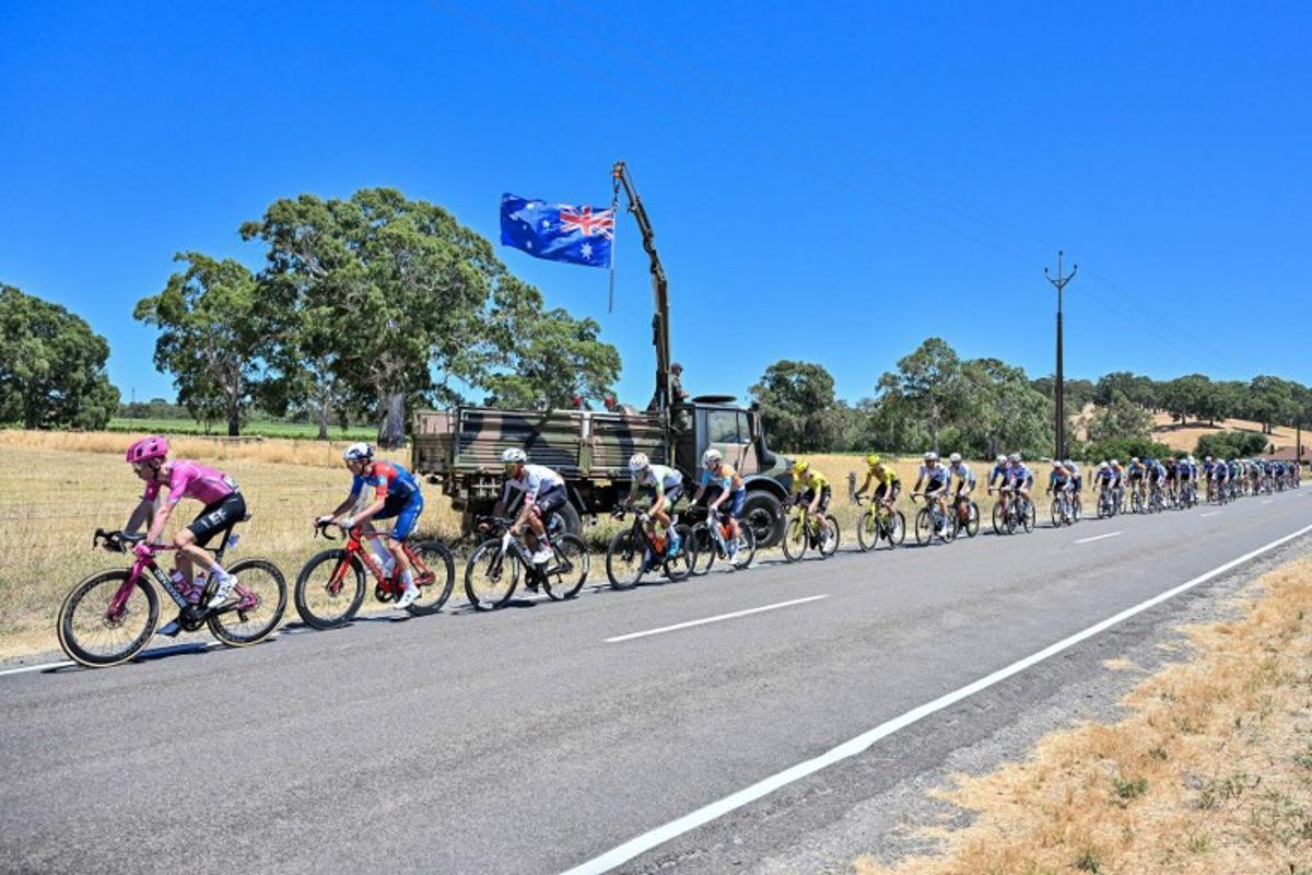 The peloton rides through the Adelaide Hills during stage three of the Tour Down Under UCI Men's Cycling race in Adelaide on January 23, 2026.  Brenton Edwards / AFP