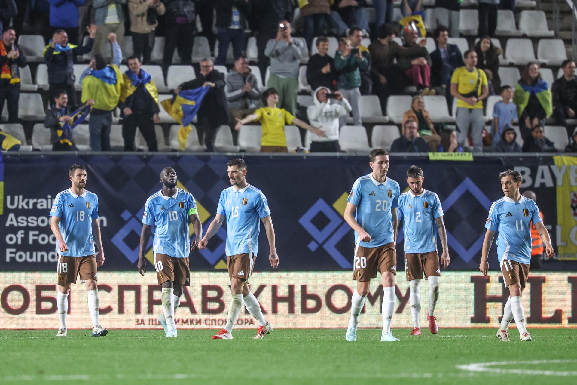Belgium's players look dejected during a soccer game between Belgian national team the Red Devils and Ukraine, Thursday 20 March 2025 in Murcia, Spain, the first leg of the play-offs in the Nations League. BELGA PHOTO VIRGINIE LEFOUR