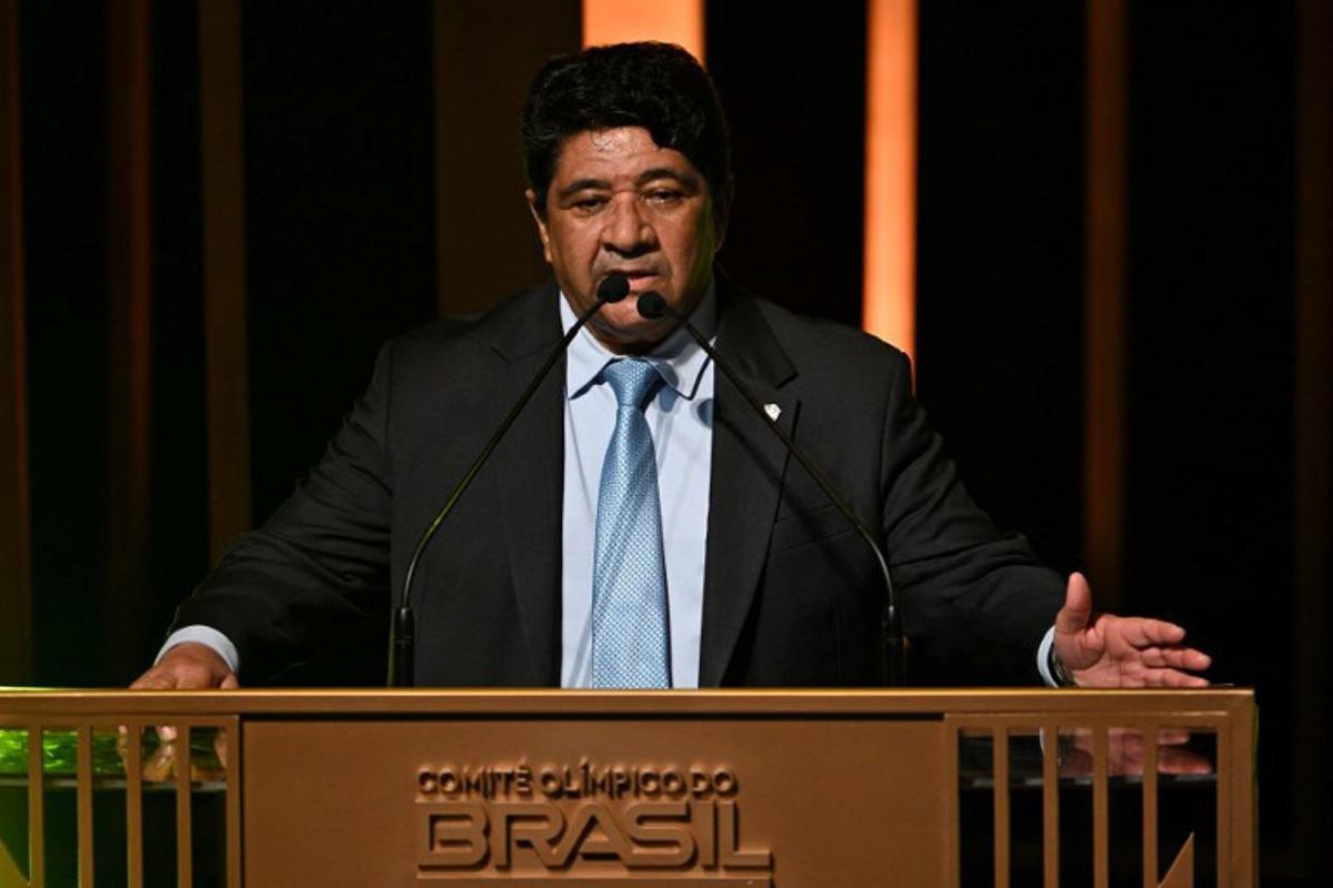 (FILES) The president of the Brazilian Football Confederation, Ednaldo Rodrigues, delivers a speech after receiving the best team of the year award for the women's national football team during the Brazil Olympic Award, a ceremony to celebrate the best Brazilian olympic athletes, at Vivo Rio music hall in Rio de Janeiro, Brazil, on December 11, 2024. A court in Rio de Janeiro ordered on May 15, 2025, the dismissal of Brazilian football federation head Ednaldo Rodrigues, ruling that a signature error nullified his employment contract. Mauro PIMENTEL / AFP