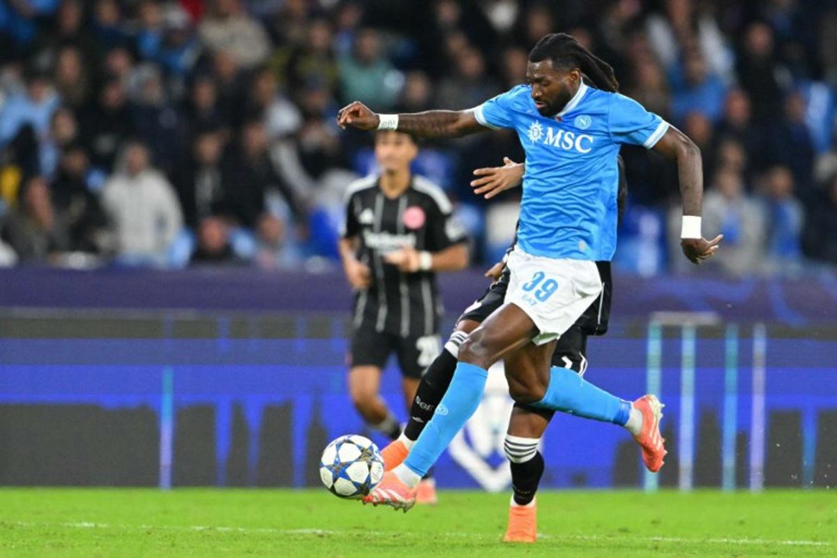 Napoli's Cameroonian midfielder #99 Andre-Frank Anguissa controls the ball during the UEFA Champions League - league phase day 4 football match between Napoli and Eintracht Frankfurt at the Diego Armando Maradona stadium in Naples on November 4, 2025.  Andreas SOLARO / AFP