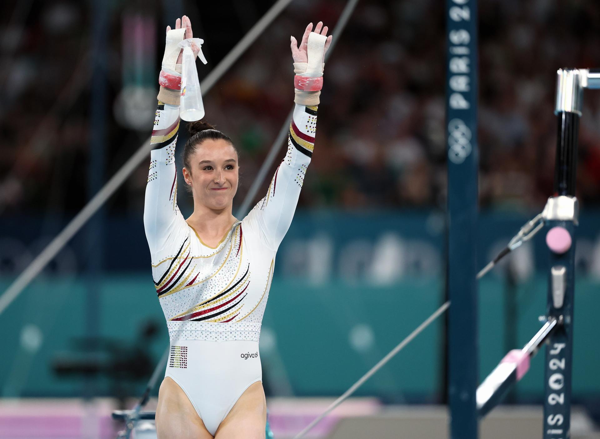 Belgian gymnast Nina Derwael reacts after the women's uneven bars final of the gymnastics competition at the Paris 2024 Olympic Games, on Sunday 04 August 2024 in Paris, France. The Games of the XXXIII Olympiad are taking place in Paris from 26 July to 11 August. The Belgian delegation counts 165 athletes competing in 21 sports. BELGA PHOTO BENOIT DOPPAGNE