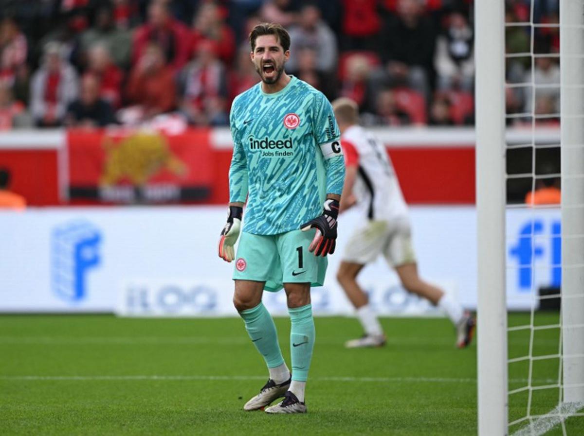Frankfurt's German goalkeeper #01 Kevin Trapp reacts during the German first division Bundesliga football match between XBayer Leverkusen and Eintracht Frankfurt in Leverkusen on October 19, 2024.  INA FASSBENDER / AFP