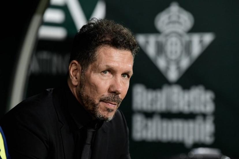 Atletico Madrid's Argentine coach Diego Simeone looks on during the Spanish league football match between Real Betis and Club Atletico de Madrid at the Cartuja Stadium in Seville on October 27, 2025.  CRISTINA QUICLER / AFP