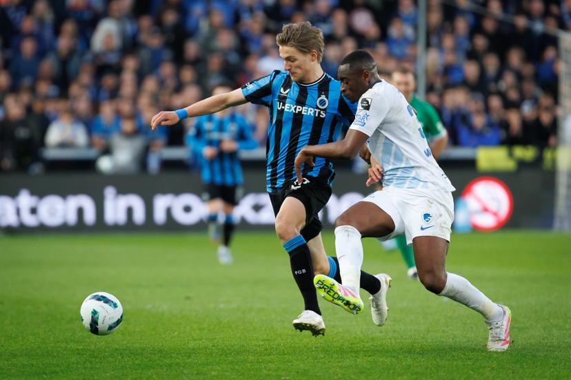 Club's Romeo Vermant and Genk's Mujaid Sadick fight for the ball during a soccer match between Club Brugge and KRC Genk, Sunday 13 April 2025 in Brugge, on day 3 (out of 10) of the Champions' Play-offs of the 2024-2025 'Jupiler Pro League' first division of the Belgian championship. BELGA PHOTO KURT DESPLENTER