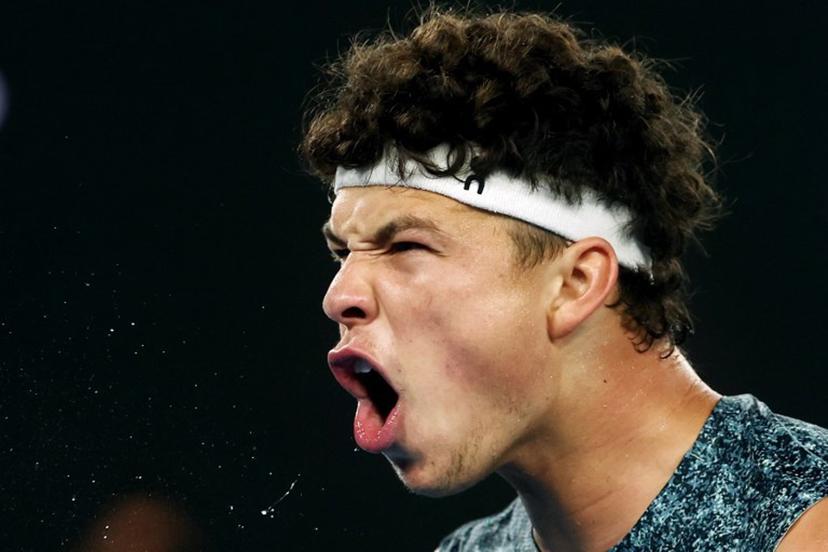 USA's Ben Shelton reacts on a point to Italy's Jannik Sinner during their men's singles quarter-final match on day eleven of the Australian Open tennis tournament in Melbourne on January 28, 2026.  Izhar Khan / AFP