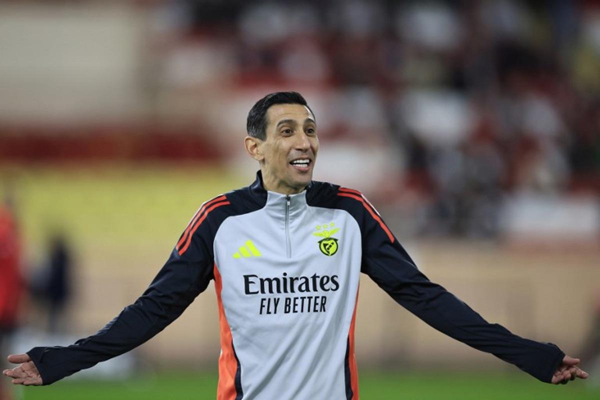 Benfica's Argentine forward #11 Angel Di Maria reacts during a warm-up session ahead of the UEFA Champions League knockout phase play-off 1st leg football match between AS Monaco and SL Benfica at the Louis II stadium (Stade Louis II) in the Principality of Monaco, on February 12, 2025.  Valery HACHE / AFP