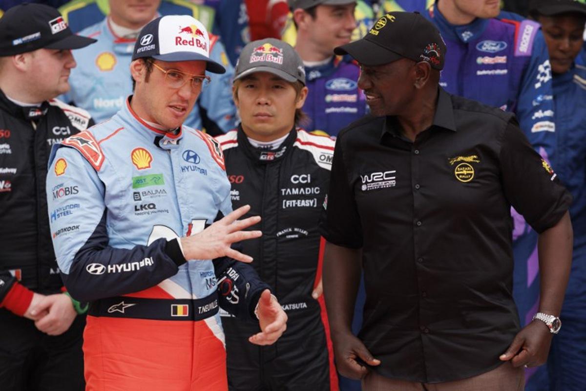 Belgian rally driver Thierry Neuville (2nd-L), Japanese rally driver Takamoto Katsuta and Kenya's President William Ruto (R) talk before the flagging-off for the World Rally Championship (WRC) Safari Rally Kenya in Nairobi on March 20, 2025.    SIMON MAINA / AFP