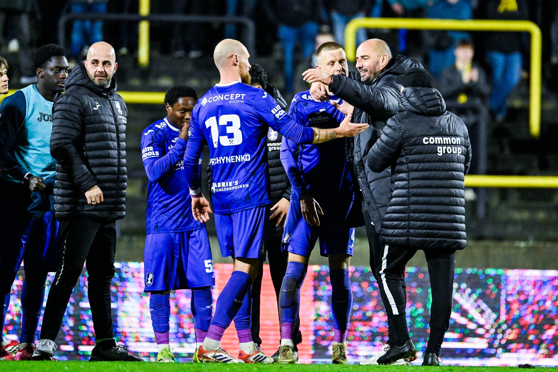 Patro Eisden's Denis Prychynenko, Patro Eisden's Kjetil Borry and Patro Eisden's head coach Stijn Stijnen celebrate after winning a soccer game between Lierse SK and Patro Eisden Maasmechelen, Friday 13 March 2026 in Lier, on day 30 of the 2025-2026 'Challenger Pro League' 1B second division of the Belgian championship. BELGA PHOTO TOM GOYVAERTS