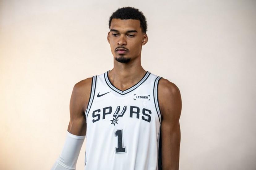 French basketball player Victor Wembanyama poses for promotional photos during the San Antonio Spurs media day at the Victory Capital Performance Center in San Antonio, Texas on September 29, 2025. Wembanyama has been cleared by the team's medical staff to play for the upcoming season. SERGIO FLORES / AFP