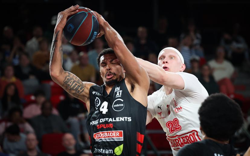 Kortrijk's Noel Coleman and Spirou's Quinten Smout fight for the ball during a basketball match between Spirou Charleroi and House of Talents Spurs Kortrijk, Sunday 19 April 2026 in Charleroi, on day 30 of the 'BNXT League' Belgian and Dutch first division basket championships. BELGA PHOTO VIRGINIE LEFOUR