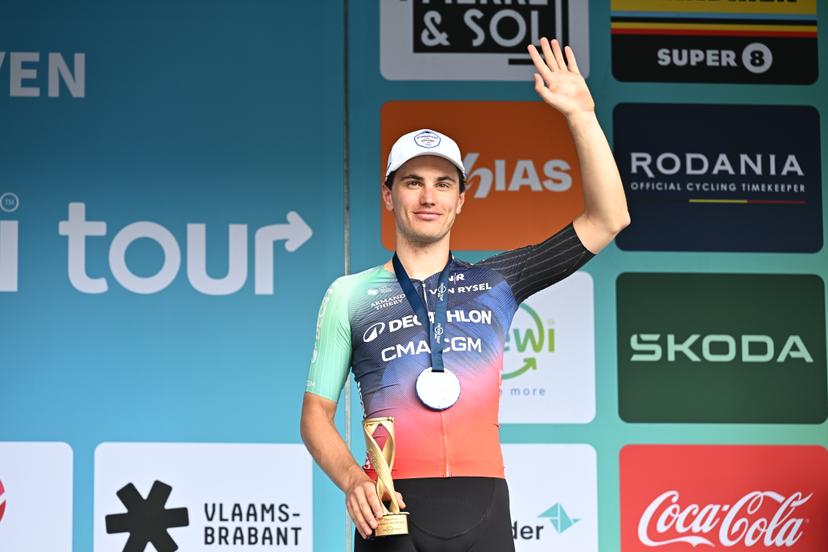 Belgian Arnaud De Lie pictured on the podium after the fifth and last stage of the 'Renewi Tour' multi-stage cycling race, from and to Leuven (183,7 km) on Sunday 23 August 2026. The five-day race takes place from 19 to 23/08. BELGA PHOTO DAVID PINTENS