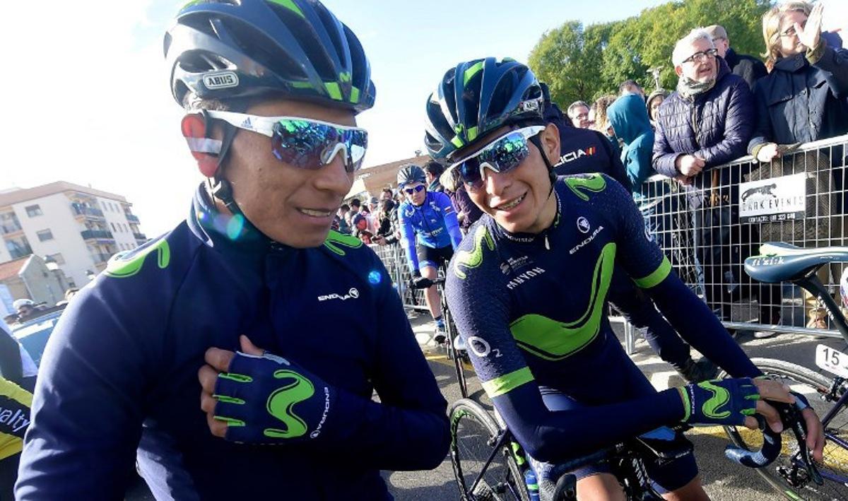(FILES) Movistar's Colombian cyclist Nairo Quintana (L) speaks with his brother and teammate Movistar's Colombian cyclist Dayer Quintana before the start of the fifth stage of the 68th edition of "Volta Ciclista a la Comunidad Valenciana" (Tour of Valencian Community), a 130,2 km run between Paterna and Valencia on February 5, 2017. Marseille's court will give its deliberations on April 2, 2025, on the trial of Colombian doctor of cyclists Nairo Quintana and Dayer Quintana, suspected of doping them during the Tour de France 2020. JOSE JORDAN / AFP