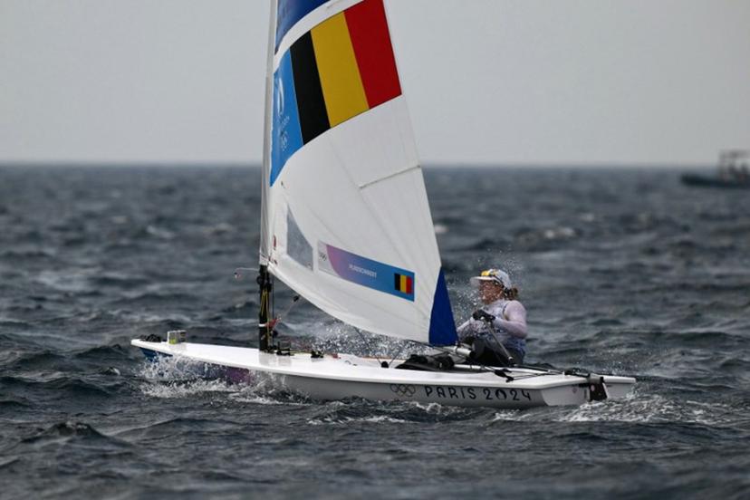 Belgium's Emma Plasschaert competes in the medal race of the women's ILCA 6 single-handed dinghy event during the Paris 2024 Olympic Games sailing competition at the Roucas-Blanc Marina in Marseille on August 7, 2024.   Christophe SIMON / AFP