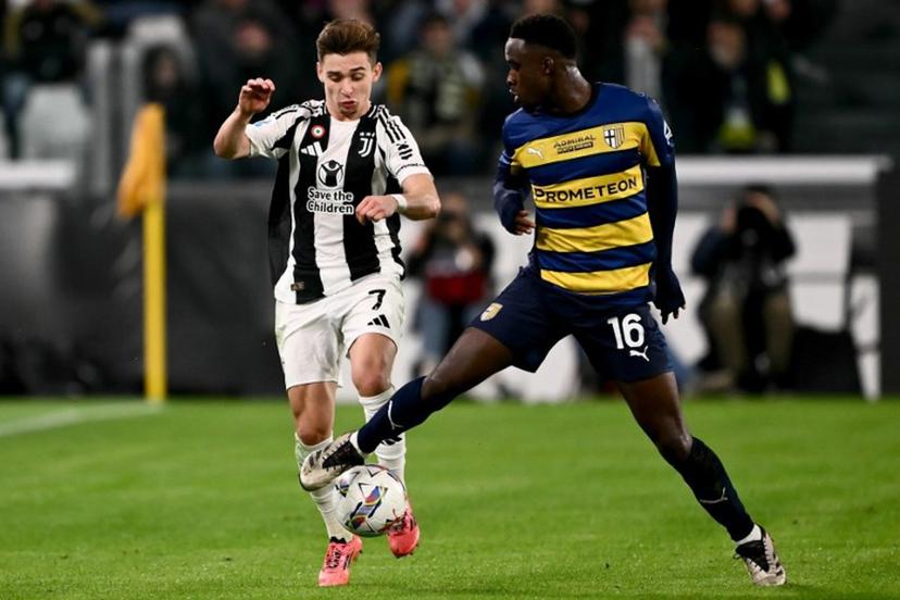 Juventus' portuguese forward Francisco Conceicao fights for the ball with Parma's Belgian midfielder Mandela Keita (R) during the Italian Serie A football match between Juventus and Parma, at the Allianz Stadium, in Turin on October 30, 2024.   Marco BERTORELLO / AFP