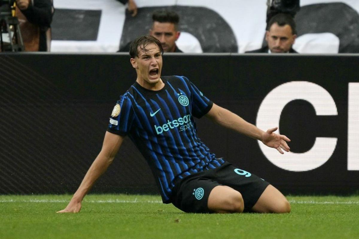 Inter Milan's Italian forward #94 Francesco Esposito celebrates scoring his team's first goal during the FIFA Club World Cup 2025 Group E football match between Italy's Inter Milan and Argentina's River Plate at the Lumen Field stadium in Seattle on June 23, 2025.  JUAN MABROMATA / AFP