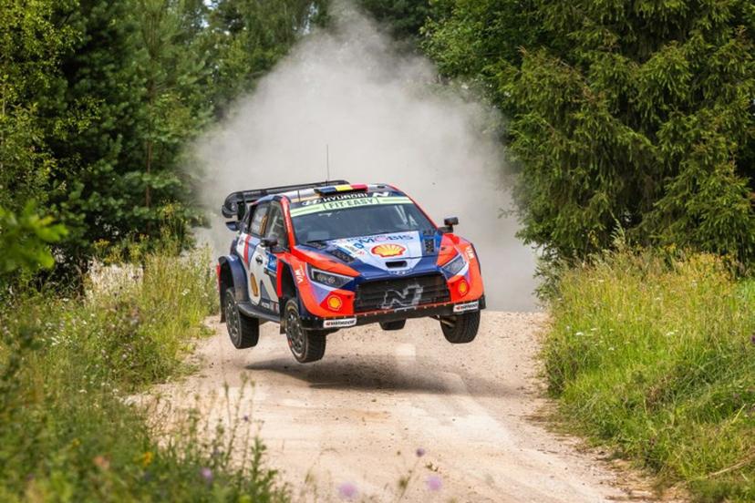Belgian driver Thierry Neuville and co-driver Martijn Wydaeghe compete in their Hyundai i20 N Rally1 during the Otepaa stage of the WRC Rally Estonia, the eighth round of the FIA World Rally Championship, on July 19, 2025 near Otepaa, Estonia.  TIMO ANIS / AFP