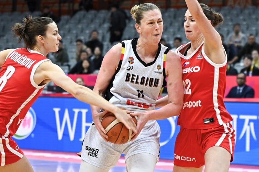 Belgium´s Emma Meesseman (C) dribbles the ball while challenged by Czech Republic´s Veronika Vorackova (L) and Emma Cechova (R) during the FIBA Women's Basketball World Cup 2026 qualifying tournament game between Belgium and Czech Republic in Wuhan, in China's central Hubei province on March 17, 2026.  CN-STR / AFP