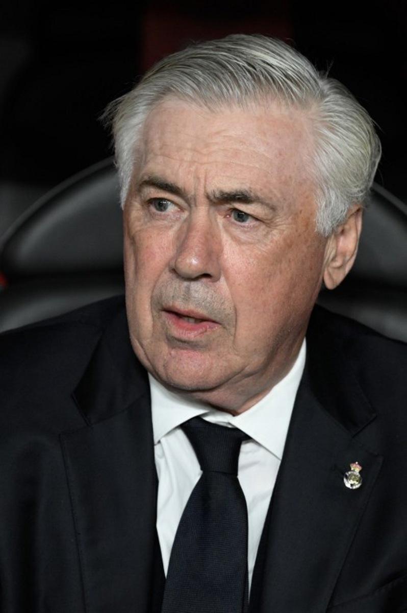 Real Madrid's Italian coach Carlo Ancelotti is pictured before the Spanish Cup, Copa del Rey (King's Cup) final football match between FC Barcelona and Real Madrid CF at La Cartuja stadium in Seville on April 26, 2025.  Josep LAGO / AFP