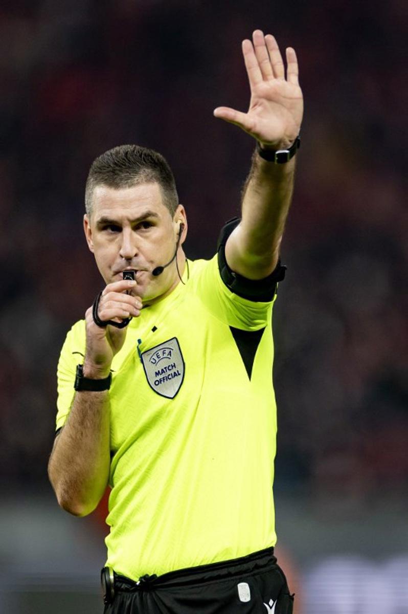 Slovenian referee Rade Obrenovic blows his whistle during the UEFA Champions League group C football match between Union Berlin and Real Madrid in Berlin, on December 12, 2023.  Odd ANDERSEN / AFP