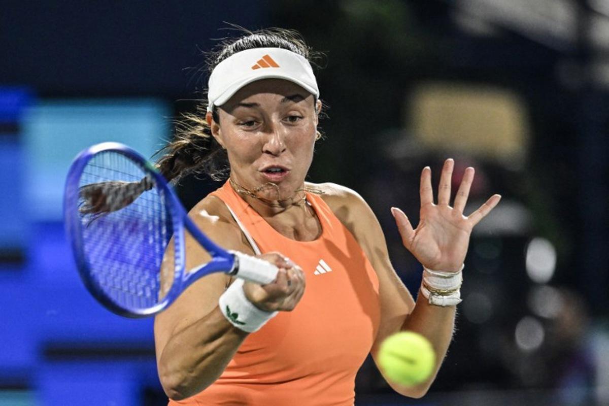 US' Jessica Pegula hits a return to Ukraine's Elina Svitolina during their women's singles final match at the Dubai Duty Free Tennis tournament in Dubai on February 21, 2026.  Ryan Lim / AFP
