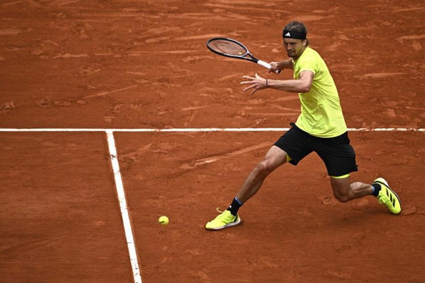 Germany's Alexander Zverev plays a forehand return to US Learner Tien during their men's singles match on day 3 of the French Open tennis tournament on Court Suzanne-Lenglen at the Roland-Garros Complex in Paris on May 27, 2025.  JULIEN DE ROSA / AFP