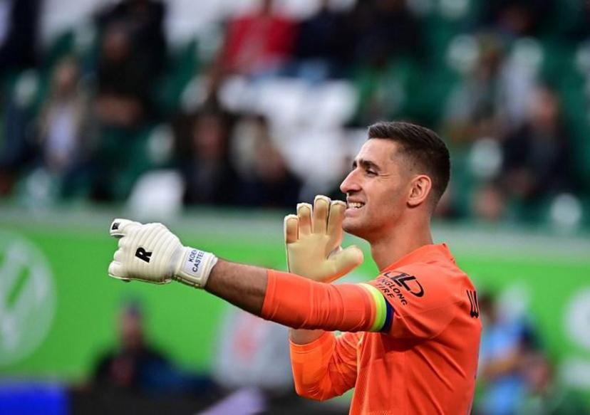 Wolfsburg¿s Belgian goalkeeper Koen Casteels reacts  during the German first division Bundesliga football match between VfL Wolfsburg and Borussia Moenchengladbach in Wolfsburg, northern Germany, on October 2, 2021.  Tobias Schwarz / AFP DFL REGULATIONS PROHIBIT ANY USE OF PHOTOGRAPHS AS IMAGE SEQUENCES AND/OR QUASI-VIDEO

