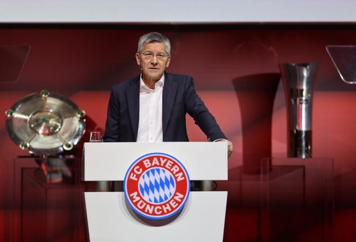 President of the German Bundesliga football club Bayern Munich and Member of the Supervisory Board of FC Bayern Munich AG Herbert Hainer speaks on the stage during the annual general meeting of the FC Bayern Munich eV in Munich on December 8, 2024. With around 360,000 members, FC Bayern Munich eV is the world's largest sports club. Founded in 1900, the club is best known for its soccer department, which was partially spun off into FC Bayern Munich AG in 2001. This year's annual general meeting will also honor Franz Beckenbauer, known as "the Kaiser," who passed away in January 2024. Alexandra BEIER / AFP