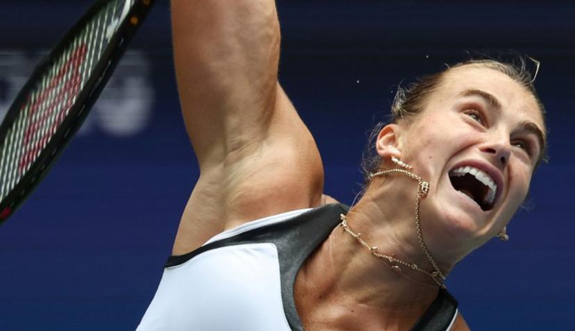 Belarus's Aryna Sabalenka serves to Switzerland's Rebeka Masarova during their women's singles first round tennis match on day one of the US Open tennis tournament at the USTA Billie Jean King National Tennis Center in New York City, on August 24, 2025.  TIMOTHY A. CLARY / AFP