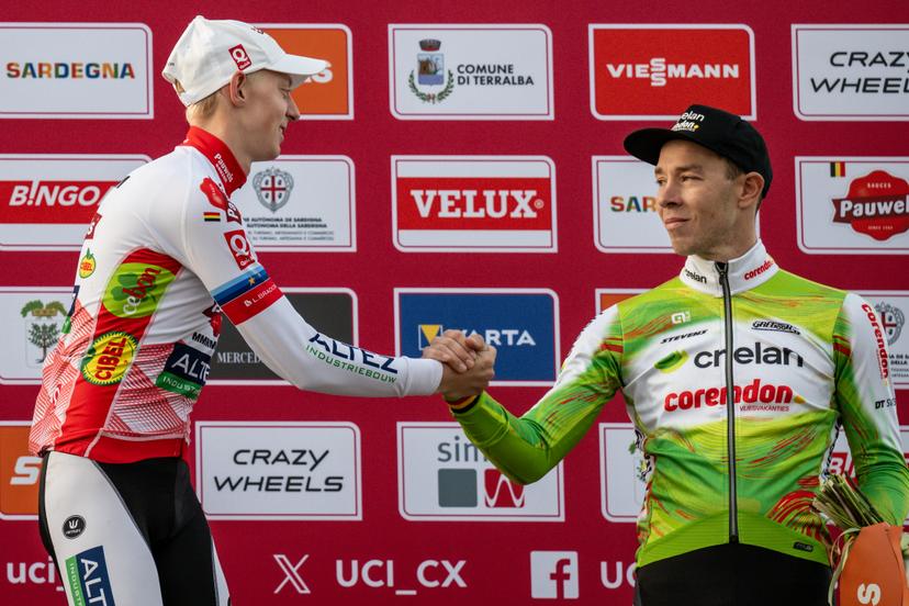 Belgian Michael Vanthourenhout and Belgian Laurens Sweeck pictured on the podium after the men's elite race of the Cyclocross World Cup, in Terralba, Sardinia, Italy, Sunday 07 December 2025, stage 3 (out of 12) in the World Cup of the 2026-2027 season. BELGA PHOTO DAVID PINTENS
