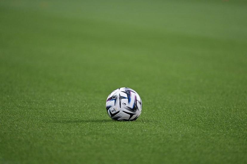 This photograph shows the the Ligue 1 ball on the pitch prior to the start of the French L1 football match between Stade Rennais FC and Olympique Lyonnais (OL) at the Roazhon Park stadium in Rennes, western France, on September 14, 2025.   DAMIEN MEYER / AFP